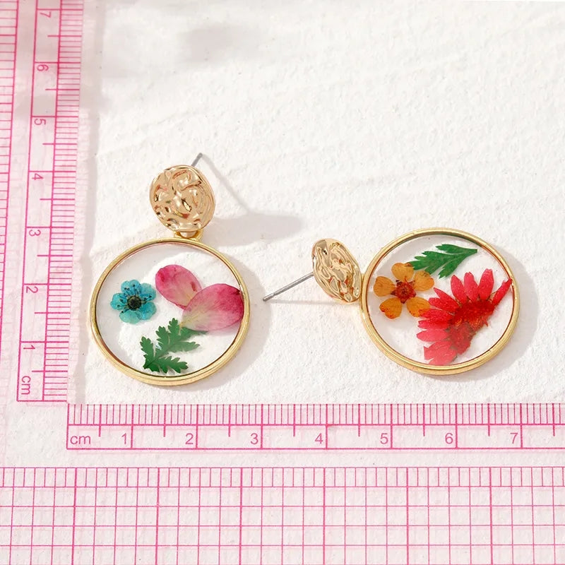 Boucles d'oreilles résine fleurs au choix