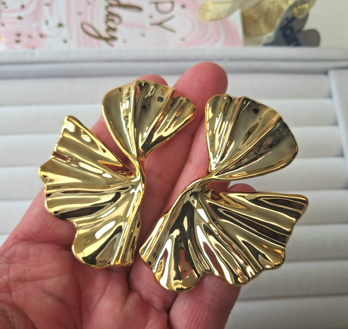 Boucles d'oreilles volutes drapées XXL