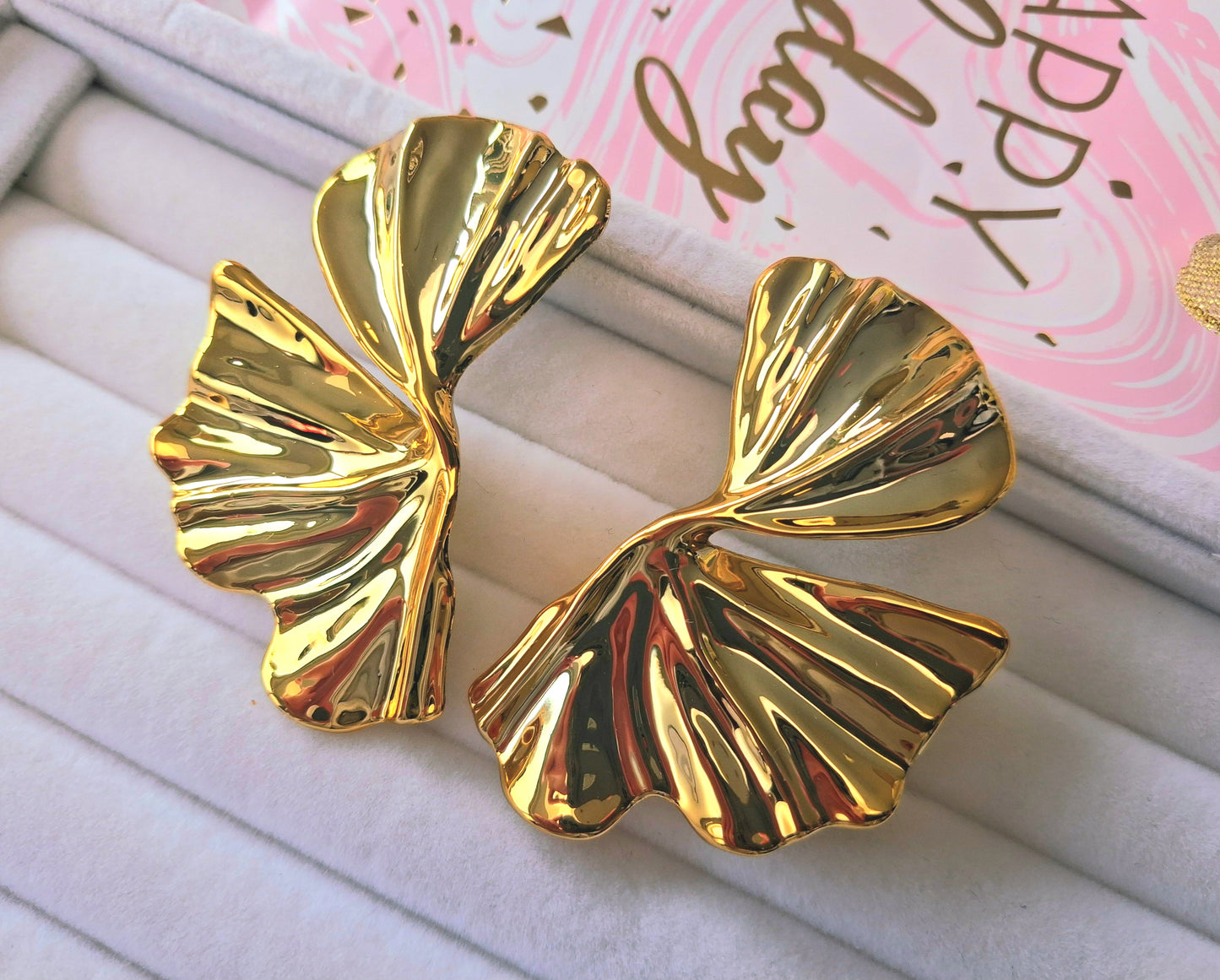 Boucles d'oreilles volutes drapées XXL