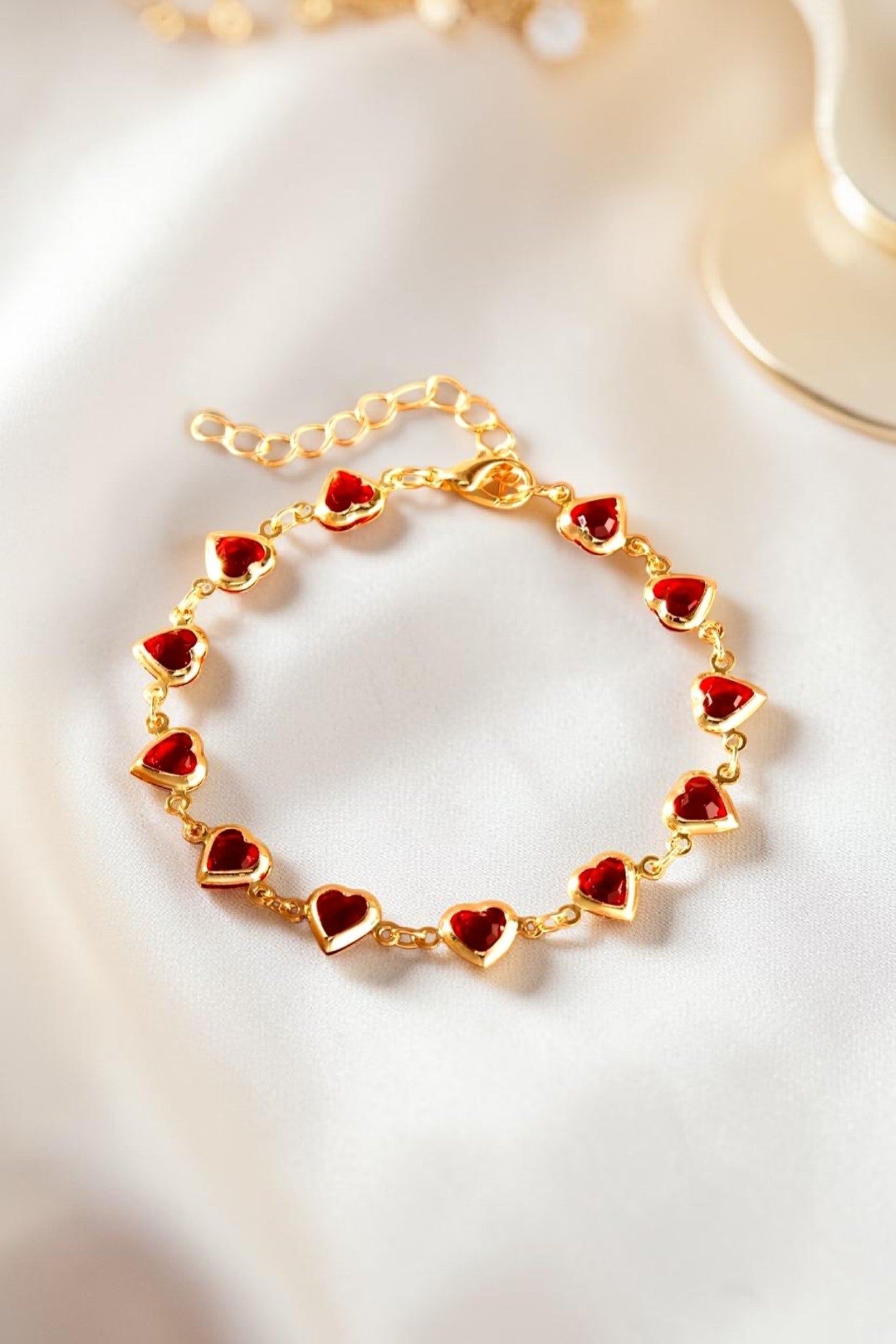 Bracelet doré à l'or fin cœurs amour