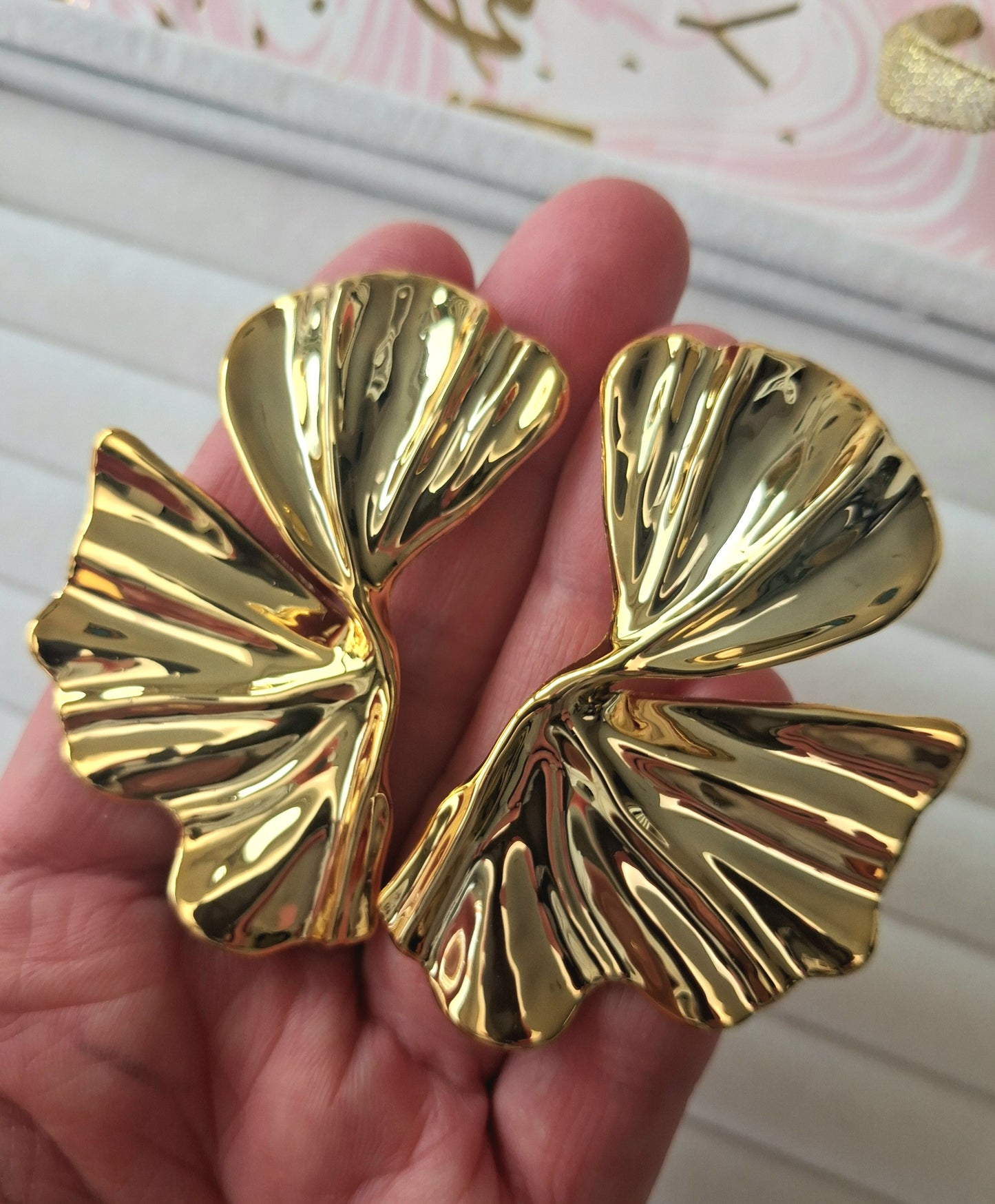 Boucles d'oreilles volutes drapées XXL