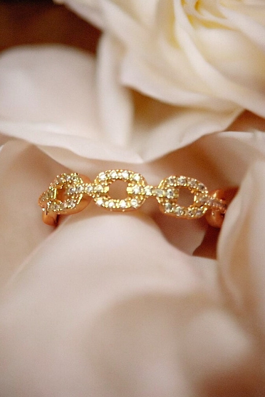 Bague dorée or fin maillons strass