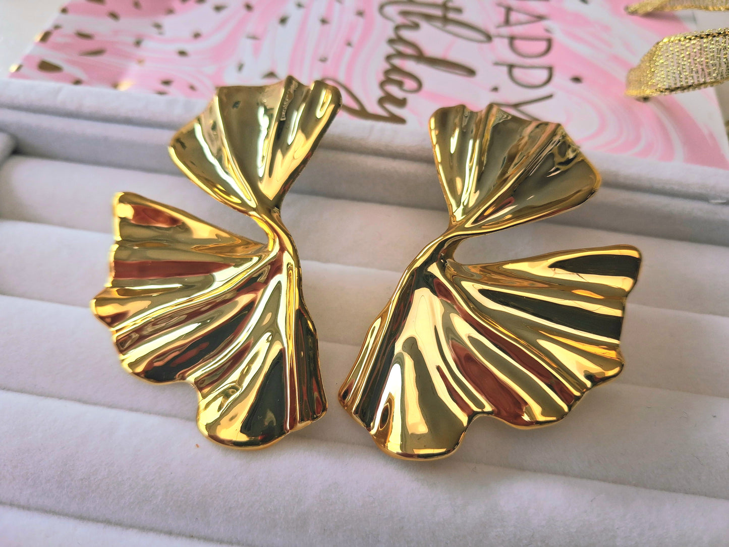 Boucles d'oreilles volutes drapées XXL