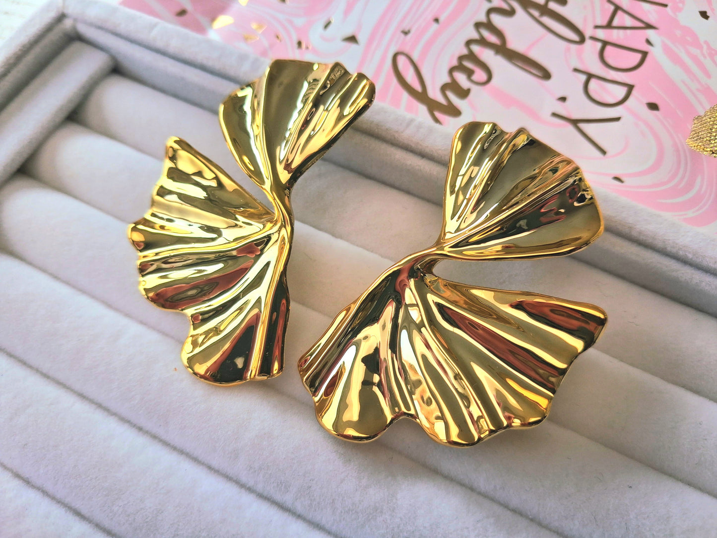 Boucles d'oreilles volutes drapées XXL