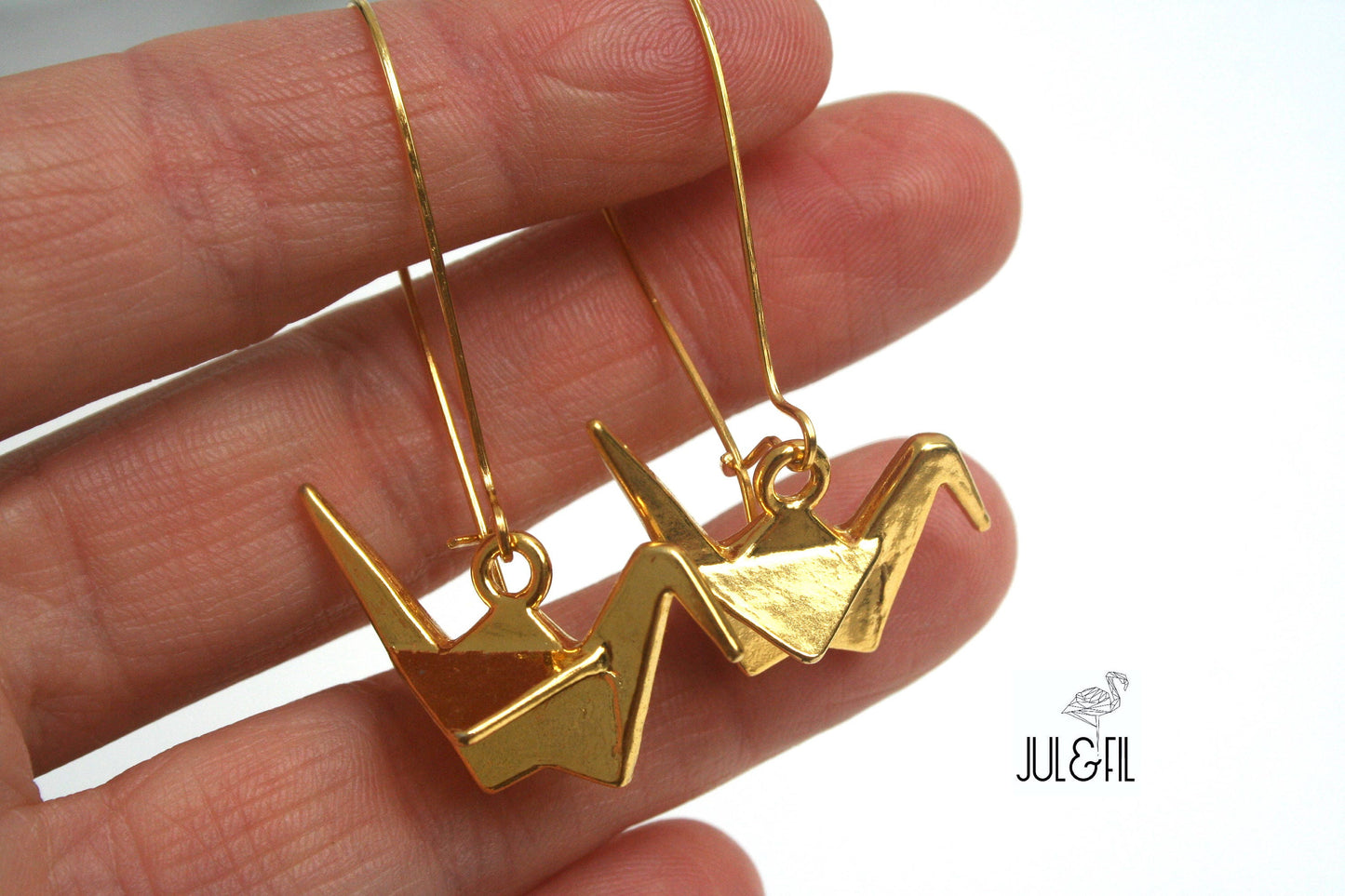 Japanese crane earrings in gilded brass