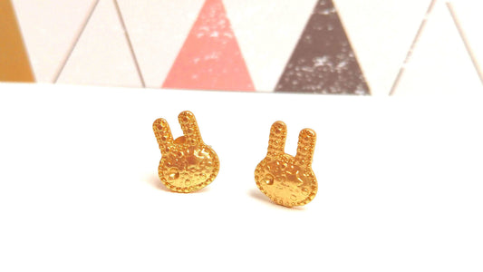 Rabbit studs in hammered golden brass