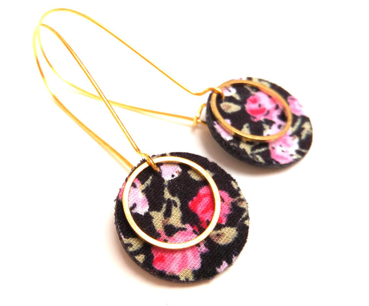 Liberty flower earrings on a black background