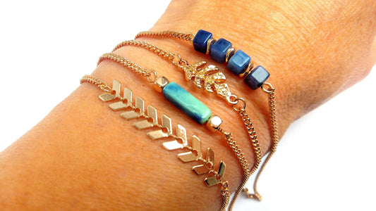 Stacking set of 4 thin TROPICAL brass adjustable bracelets