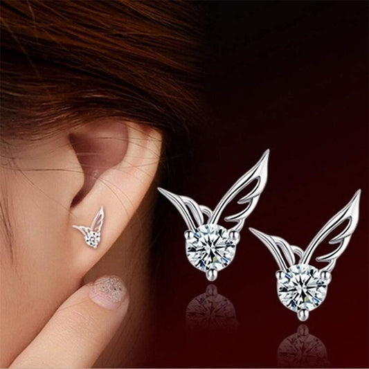 Puces d'oreilles ailes d'ange sur strass taillé