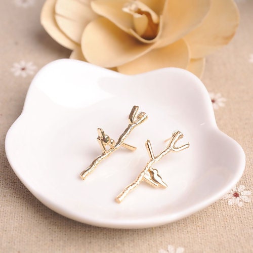 Boucles d'oreilles oiseaux sur la branche