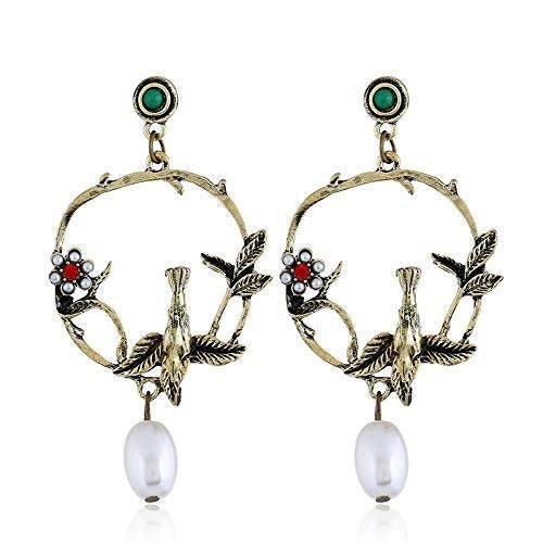 Bird and pearl dangling earrings